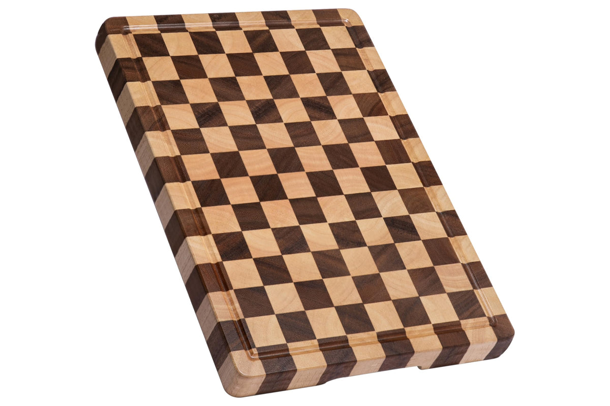 Thetchry acacia cutting board with checkered surface, juice grooves, and handles for easy transfer.