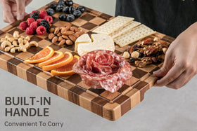 Thetchry cutting board with built-in side handles for easy transport.