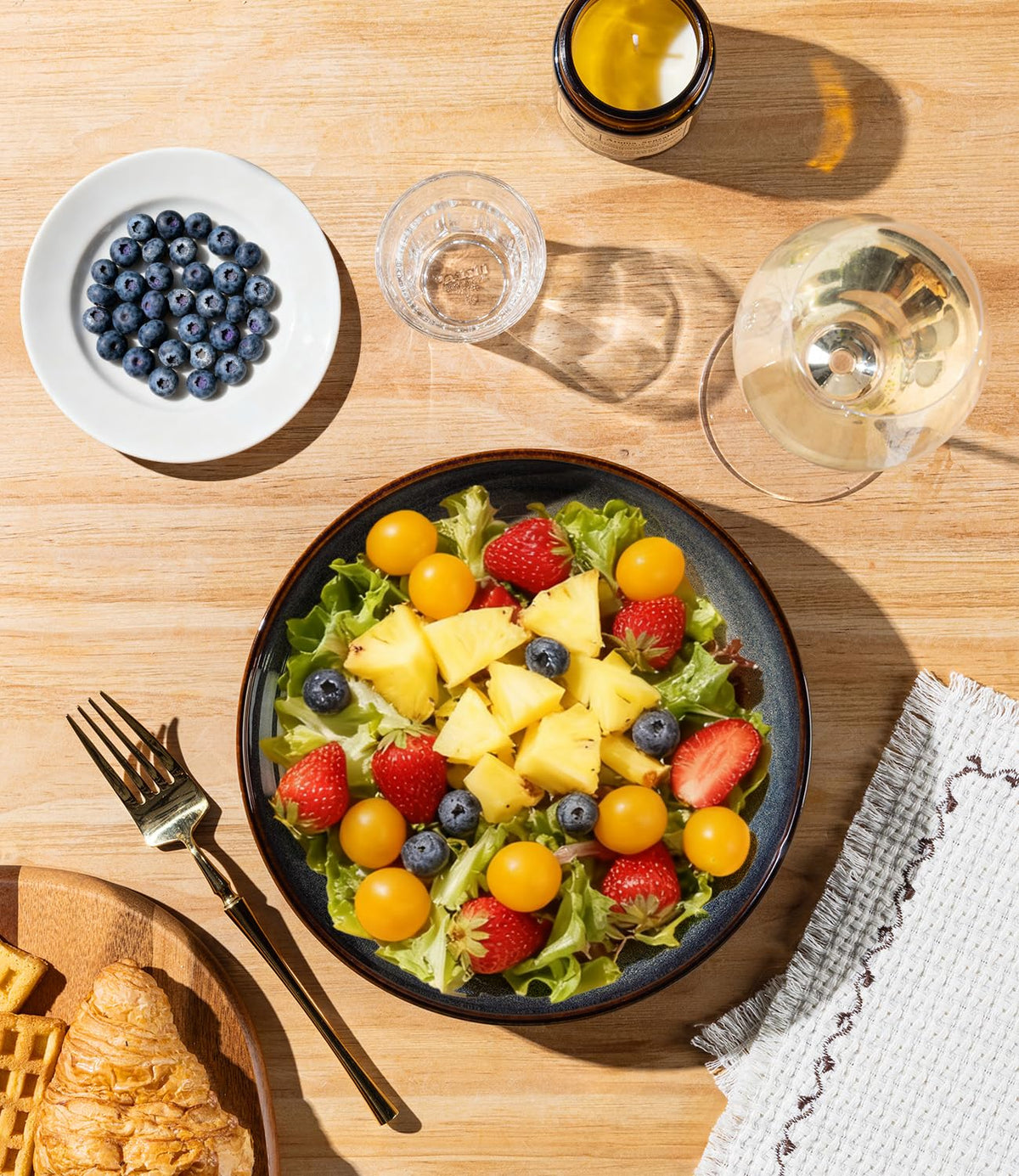 theterra bowls used for salads at a family table.