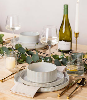 TheTerra table setting showcasing plates and bowls ready for a meal