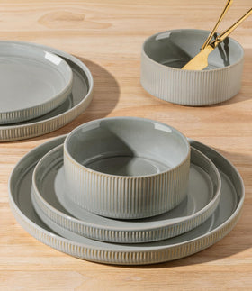 TheTerra stackable dinnerware enables compact storage and easy cleanup.