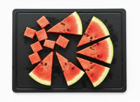 Thirteen Chefs black cutting board with juice groove for mess-free meat prep