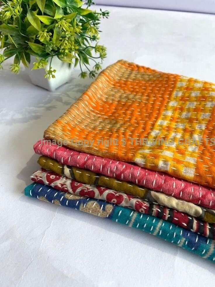 THRIVING kantha napkin floral print enhances an elegant table setting.