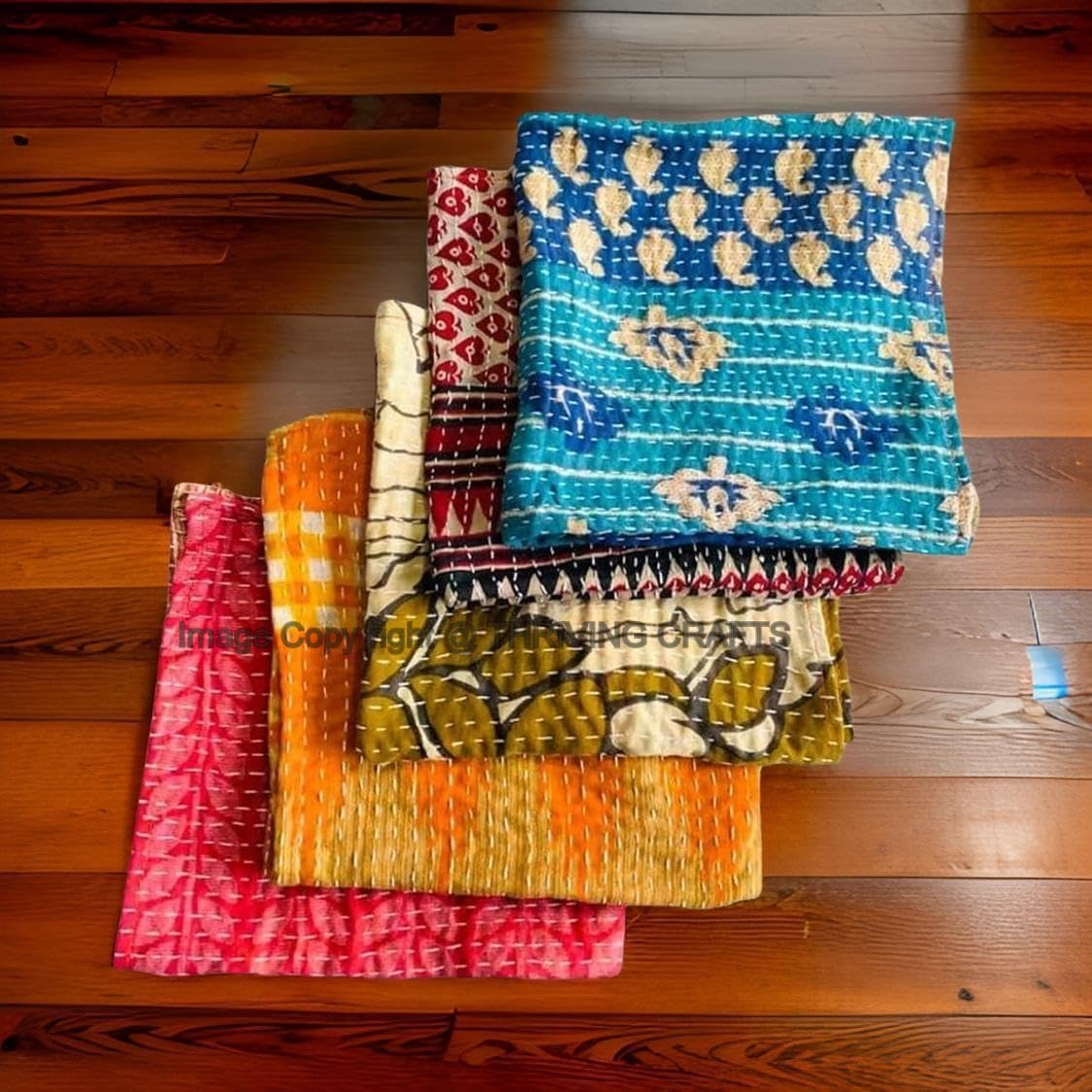 THRIVING kantha napkin in vibrant colors brightens everyday dining.