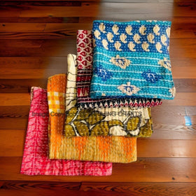 THRIVING kantha napkin in vibrant colors brightens everyday dining.