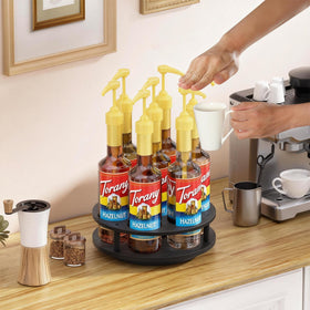 THYGIFTREE display stand for wine bottles alongside syrups