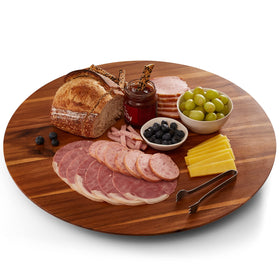 Tidita 21-inch acacia Lazy Susan on table showing spacious serving surface