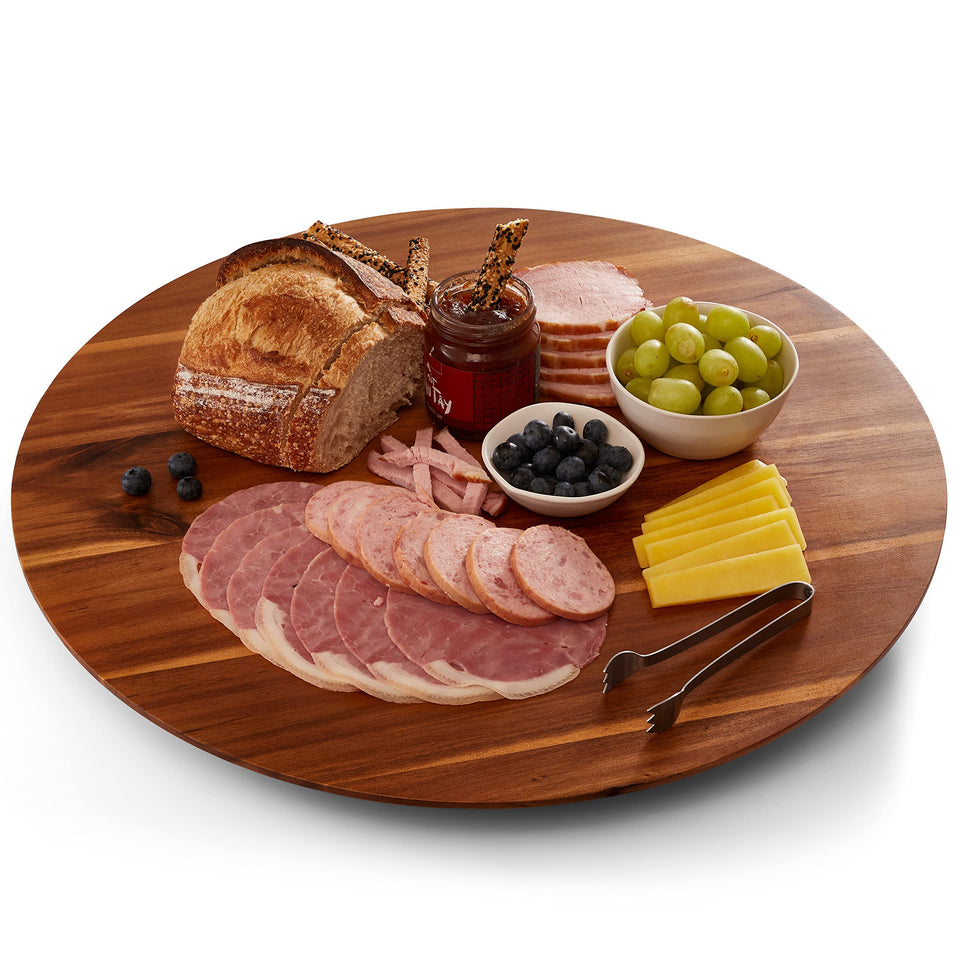 Tidita 21-inch acacia Lazy Susan on table showing spacious serving surface