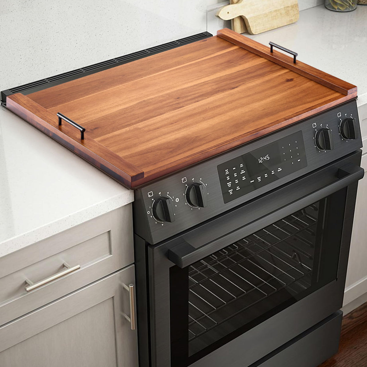 Tidita Acacia wood stove-top cover adds extra counter space.