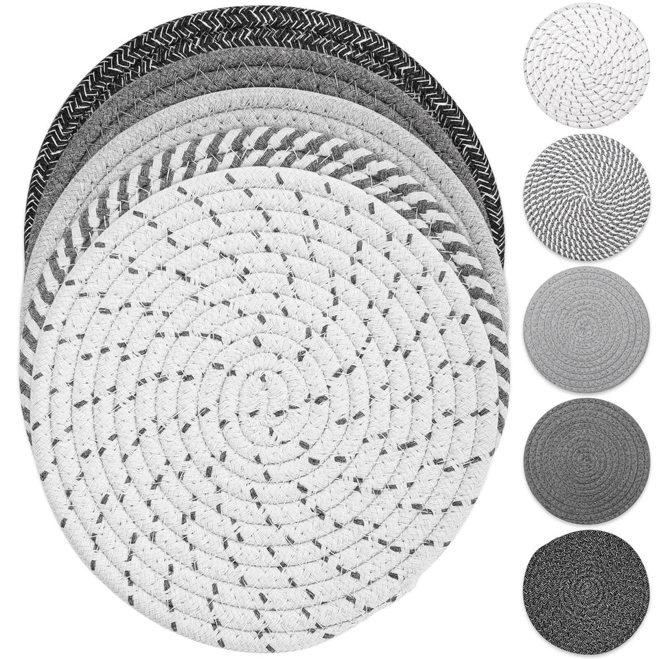 Tidponra Trivet Mats set in five colors protecting a table from hot dishes.