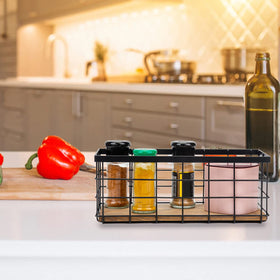 TIEYIPIN wire storage basket on a kitchen counter keeps essentials organized.