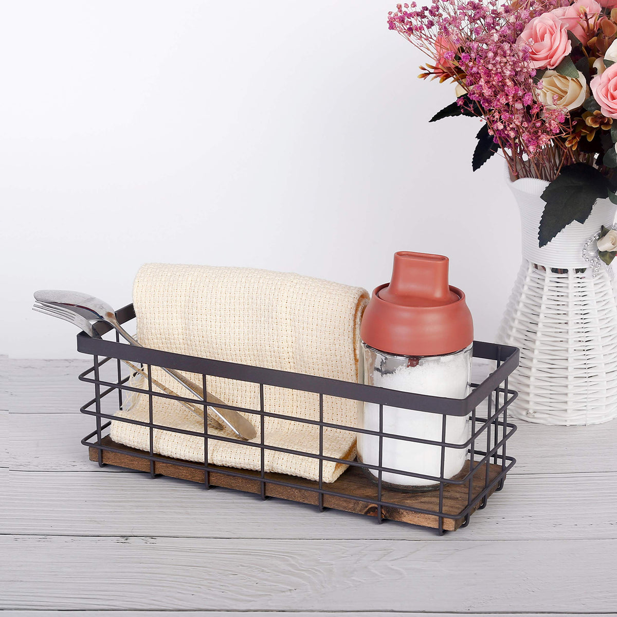 TIEYIPIN storage basket on kitchen cabinet stores spices and condiments neatly.