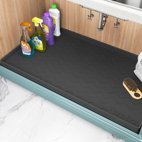 TigeJoy 34x22 under-sink mat with raised edge protecting cabinets