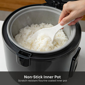 Tiger JNP-S18U-KY inner pot highlights non-stick surface for quick cleanup.