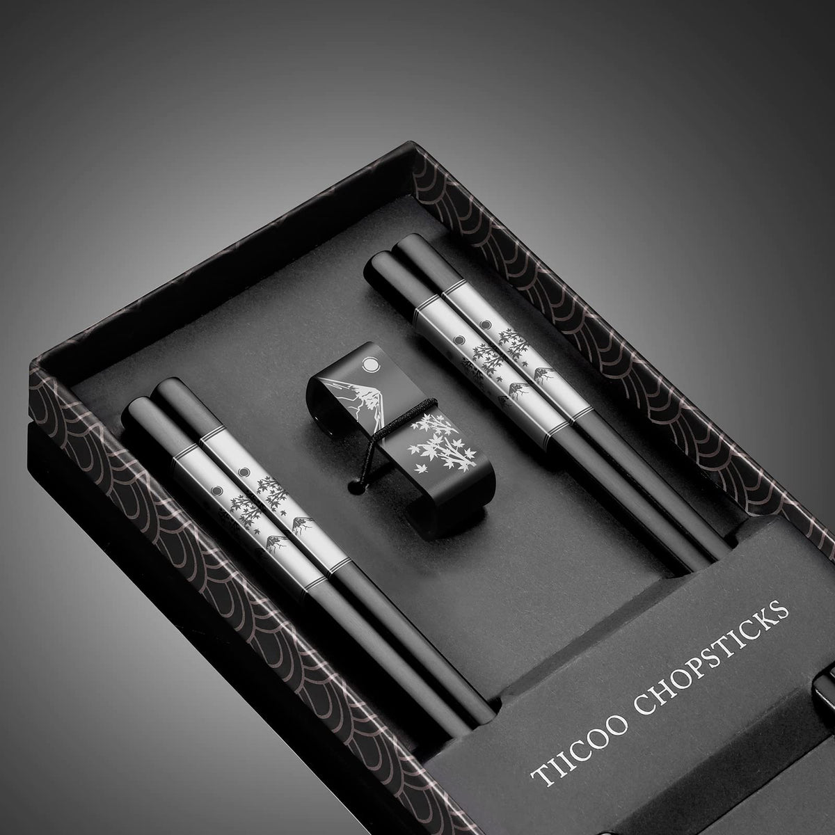 TIICOO chopsticks with maple leaf engraving for refined dining experiences.