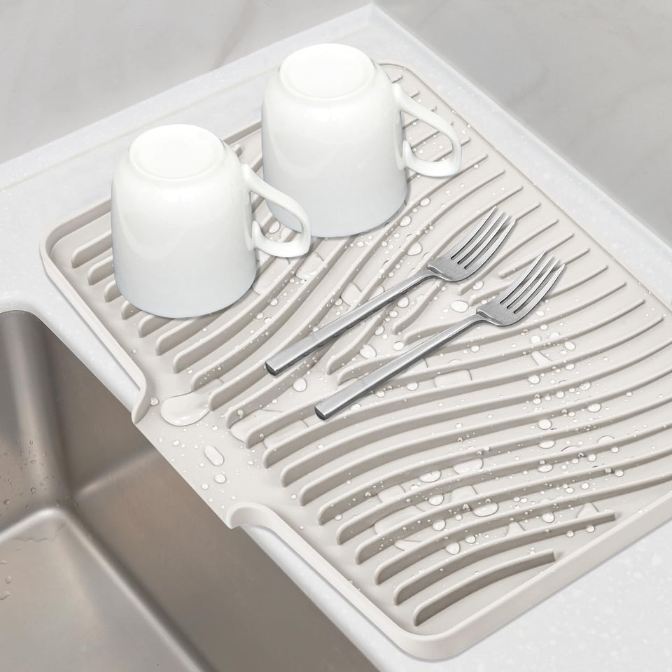 TIKNIK silicone drying mat on counter, top view emphasizes quick air drying.