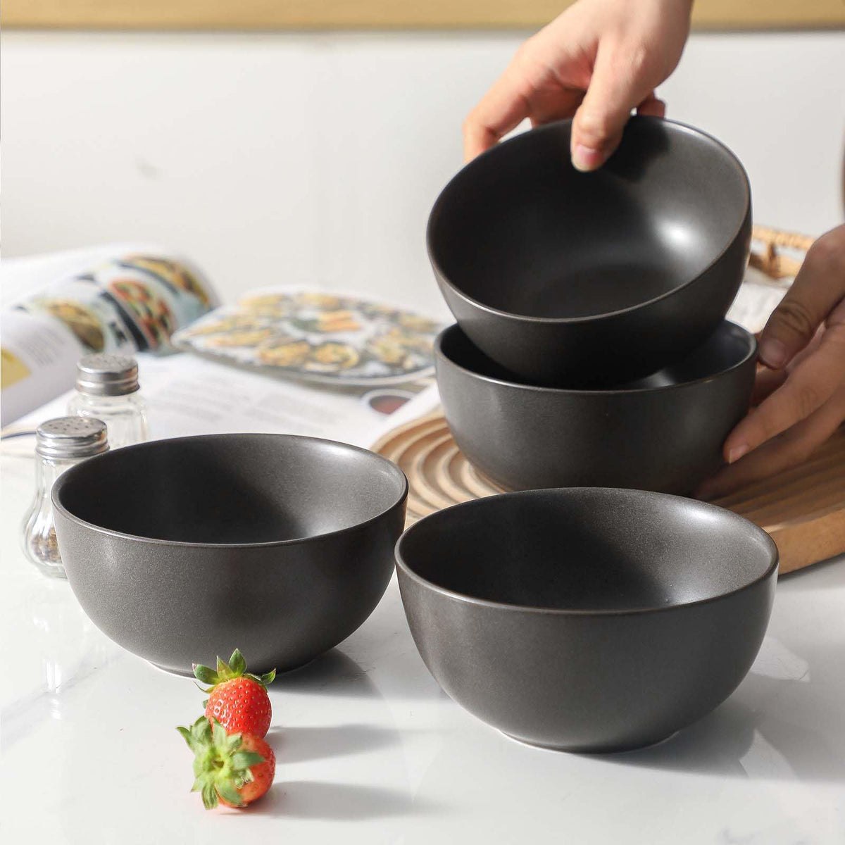Tikooere matte-black glaze closeup highlights modern, durable stoneware.