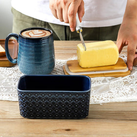 Secure lid seals in fridge odors and keeps butter fresh on the counter.