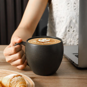 Tikooere classic black stackable mugs ideal for space-saving kitchen storage.