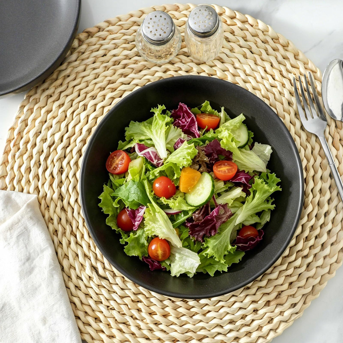 Tikooere handcrafted ceramic bowls with matte glaze elevate table presentation.