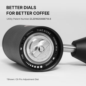 TIMEMORE C5 Pro travel-ready grinder beside a mug.