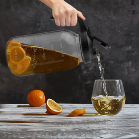 Tinaforld 64 oz glass pitcher pouring action for effortless serving