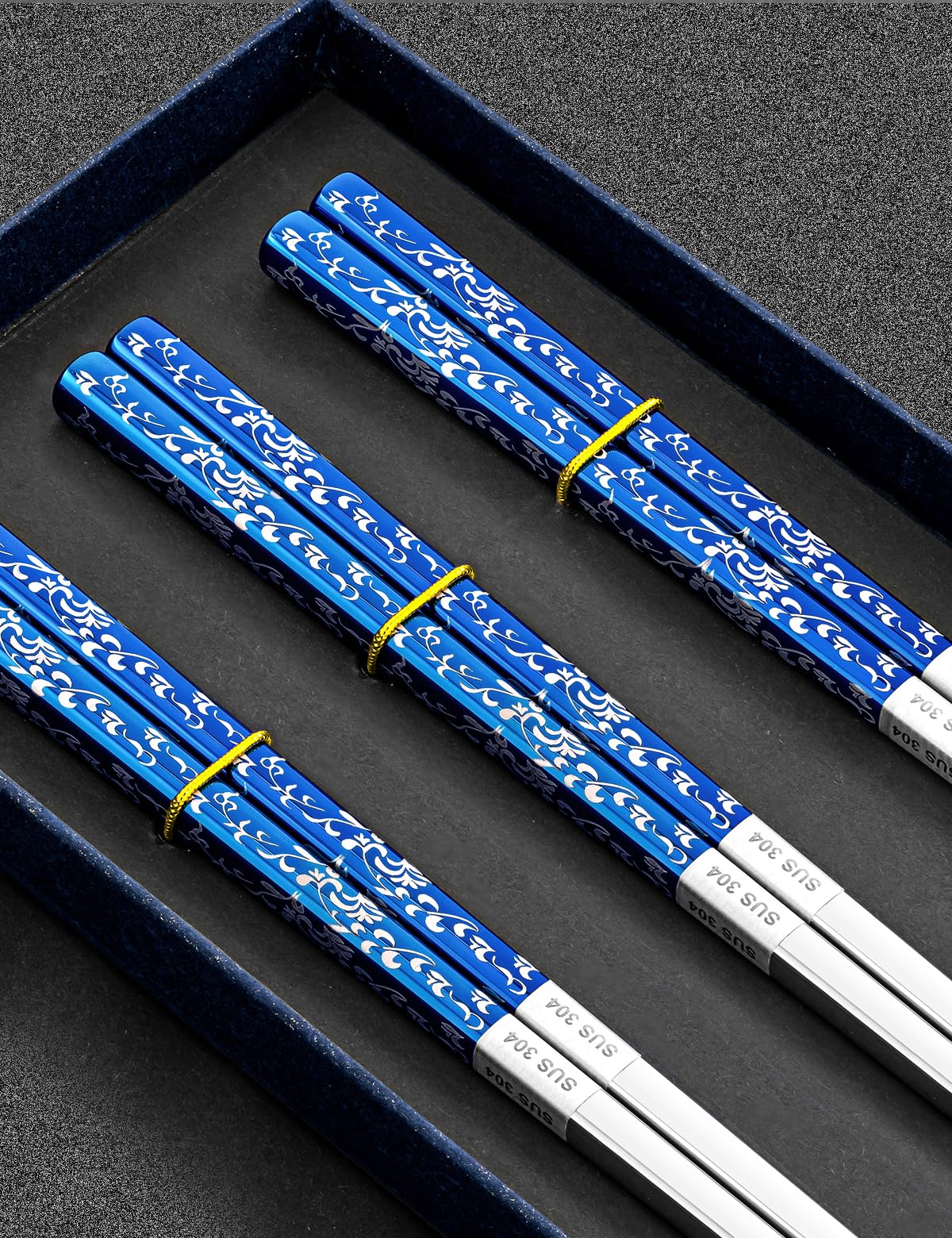 TINMARDA chopsticks featuring engraved pattern for elegant dining.