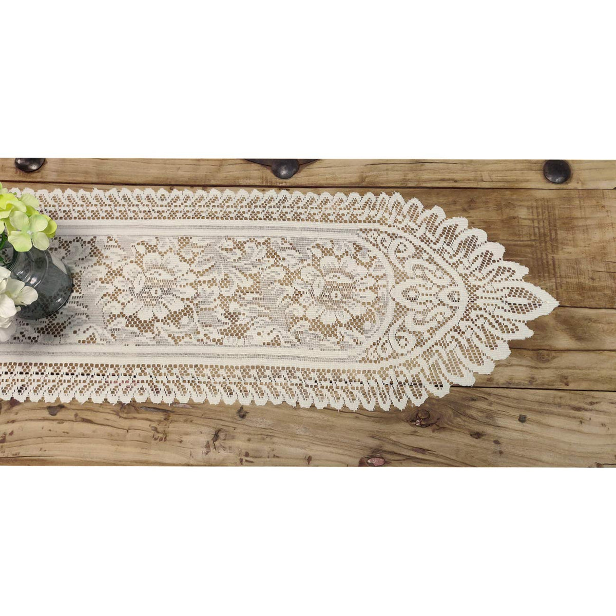 Tinsow crochet lace pattern in beige enhances dresser decor with delicate texture.