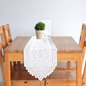 Tinsow scalloped edge white lace runner highlights intricate design for special occasions.