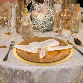 Tioncy gold round placemats, outdoor dining setup with elegant shimmer.