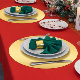Tioncy wedding table setting with placemats, shimmering gold accents.