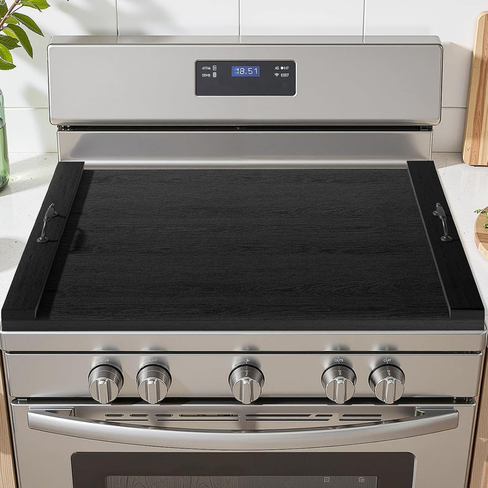 TIRYIUOU stove top cover on a four-burner stove expanding counter space.