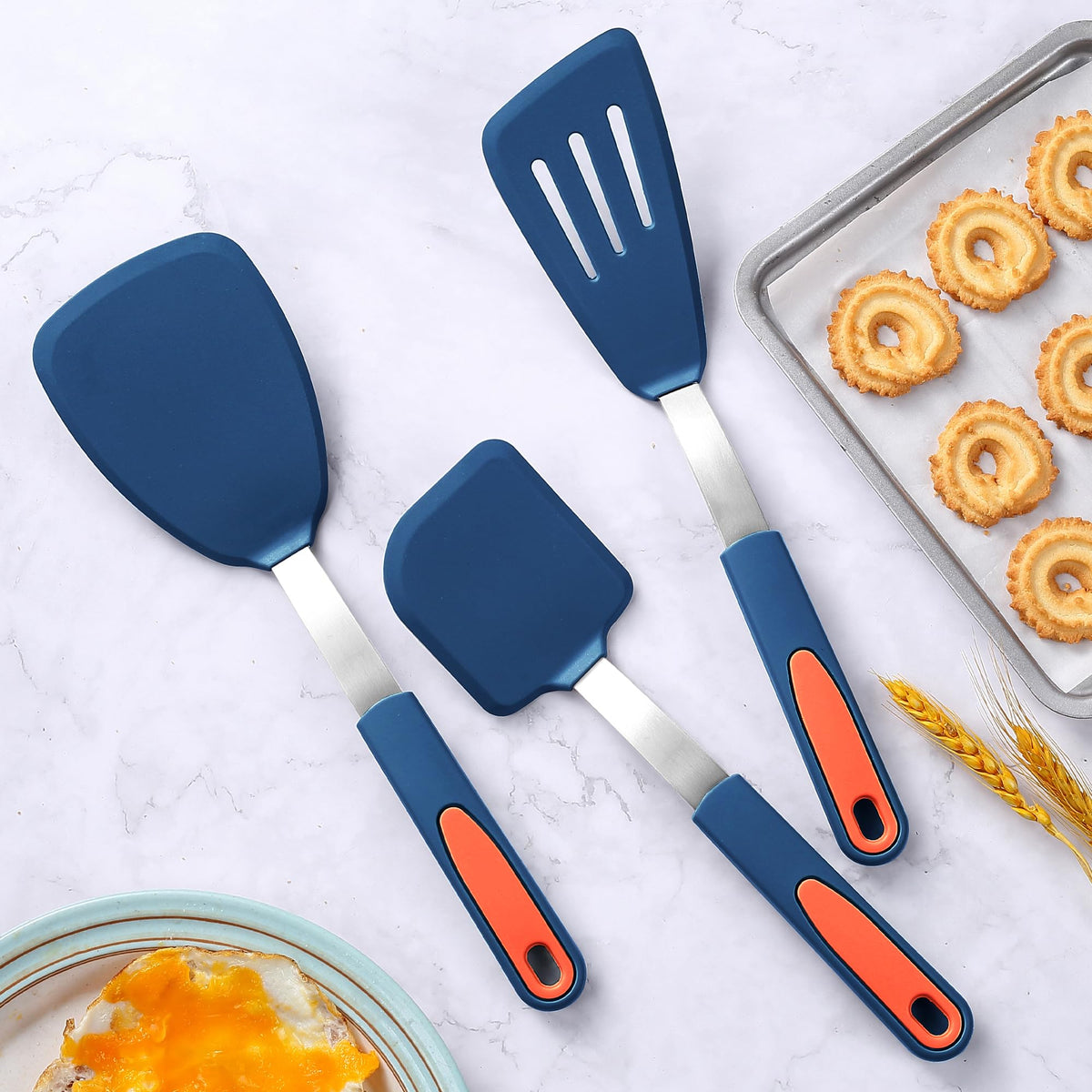 To encounter spatula with hanging holes for easy drying and storage