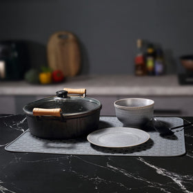 To encounter silicone dish drying mat folds compactly for easy storage after use.