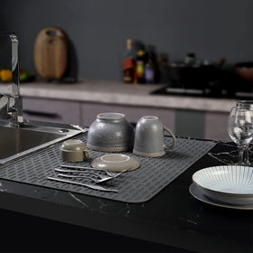To encounter silicone dish drying mat withstands negative 40 to 446 F, protecting surfaces from heat.