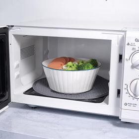 To encounter silicone microwave mat with grooved edges for easy grip and even heat.