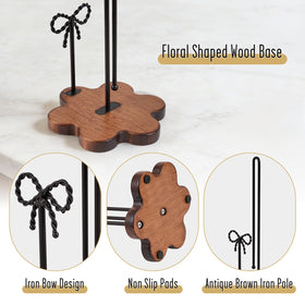 Bow accent detail adds vintage charm to the Tocemei holder.