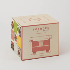 TOFUDEE paneer and cheese press shapes cheese with cheesecloth.