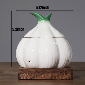 TOIVO garlic storage container with venting reduces moisture buildup.