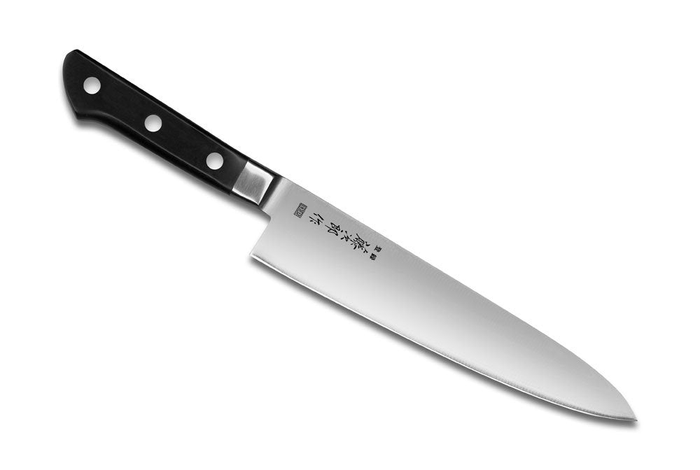 Tojiro blade close-up showing VG10 edge for precision