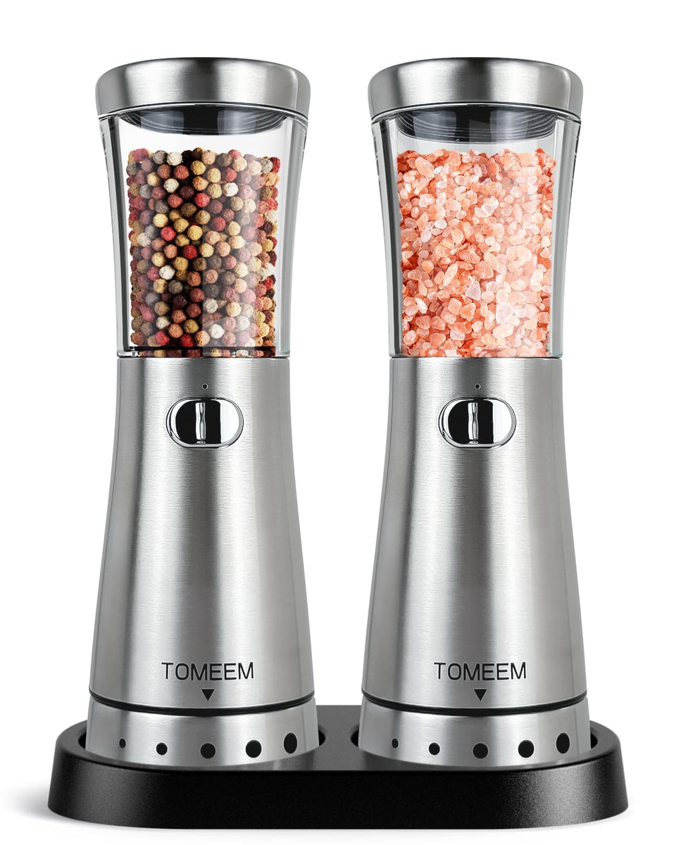 TOMEEM electric grinder with storage base on the counter, ready for quick seasoning