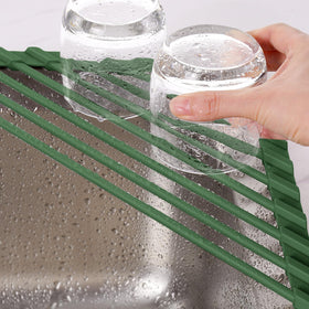 Tomorotec over-sink organizer holding dishes, sponges, and brushes