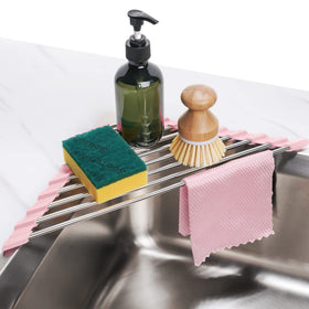 Tomorotec pink triangle foldable rack over sink for space-saving drying.