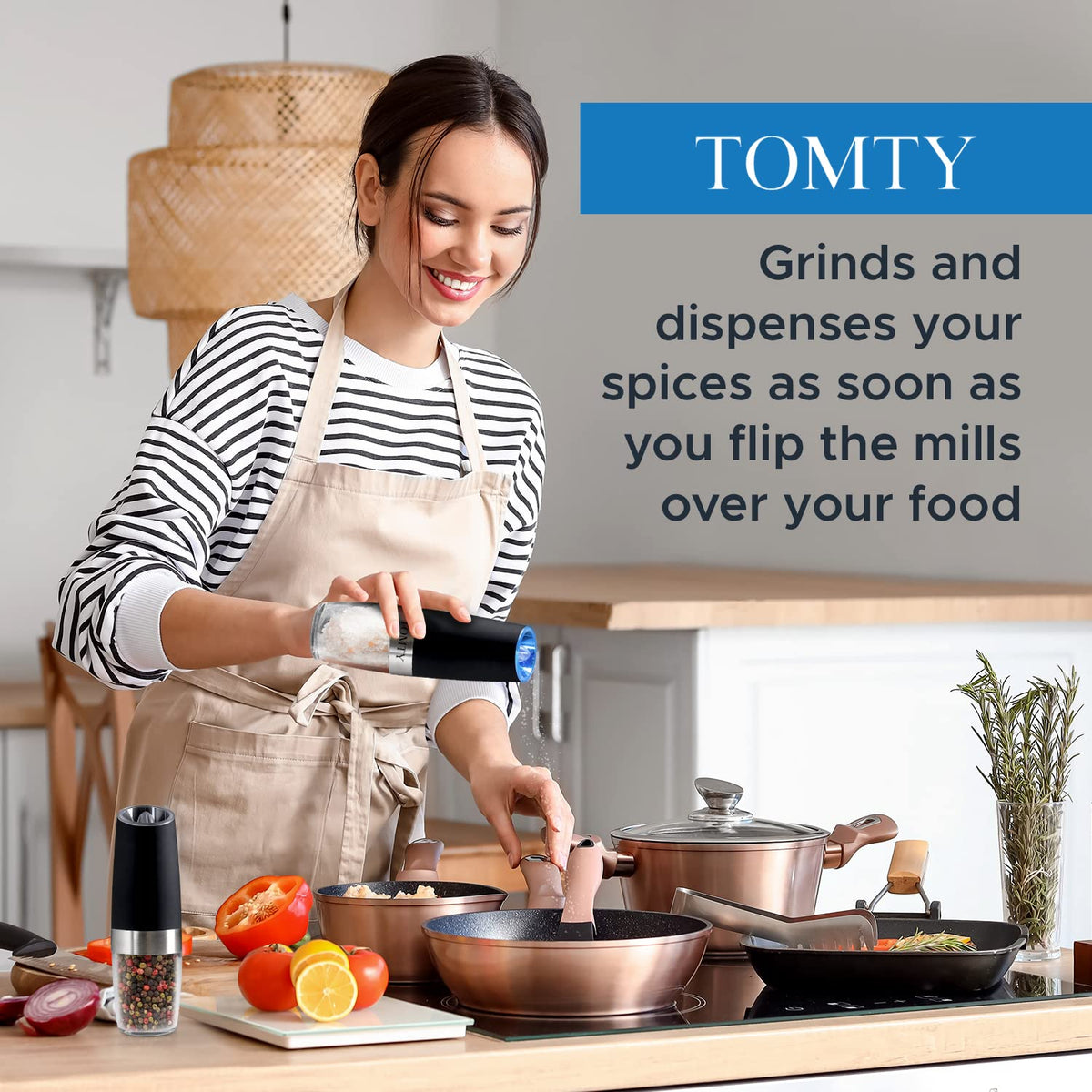 TOMTY gravity grinder with blue LED illuminates spice output for precise seasoning.