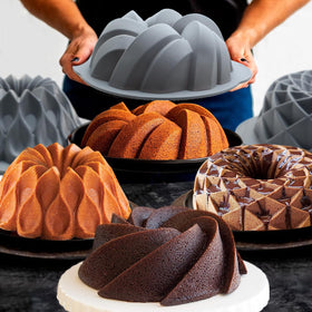Tongjude 9-cup fluted pan on countertop ready for batter