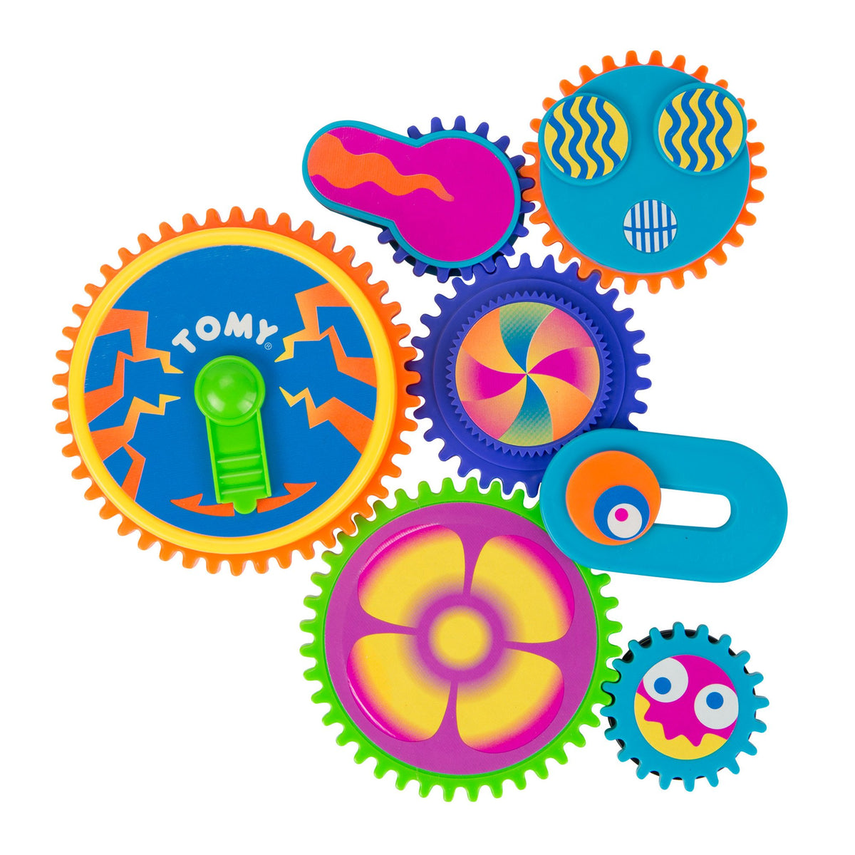 Toomies Gearation magnets on the fridge set for creative play and fine motor skills.