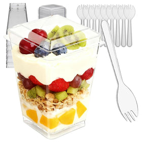 Toowood clear dessert cups with lids and spoons for party servings.