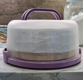Top Shelf Elements round cake carrier base assembly showing modular serving tray for easy portioning.