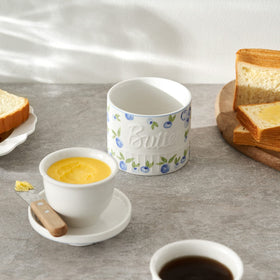 Toptier crock holds approximately 1 to 1.3 sticks of butter