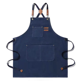 Tosewever canvas cross-back apron front view showing full coverage for cooking.